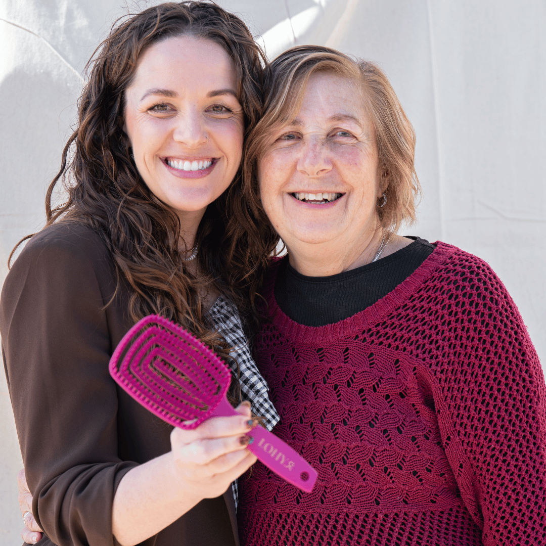Jonina and her mother pictured with pink LOHY. Paddle Brush