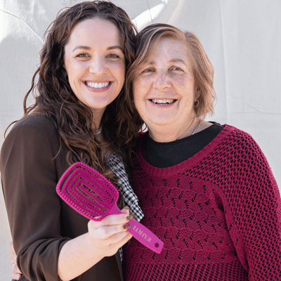 Jonina and her mother pictured with pink LOHY. Paddle Brush